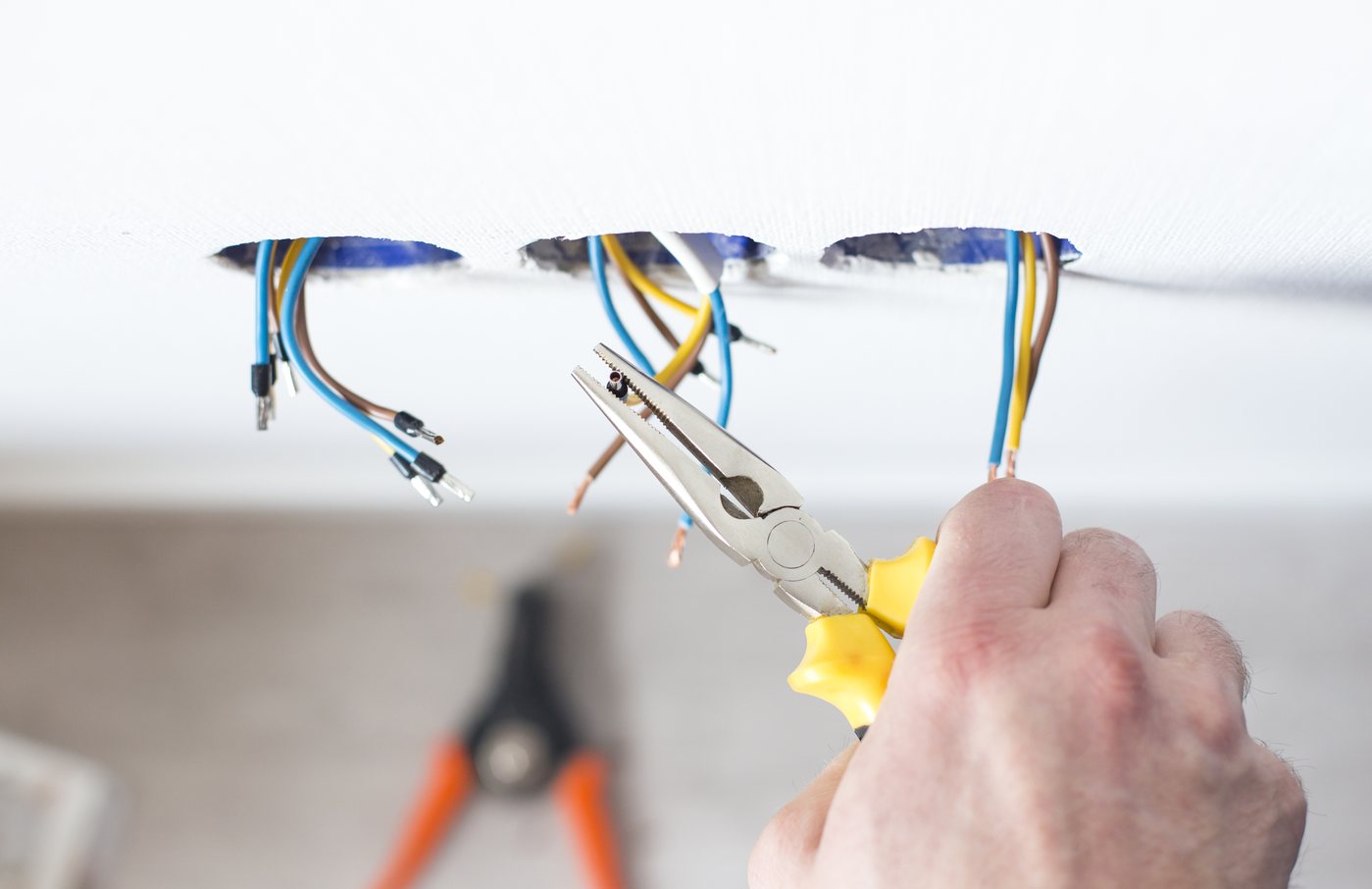 Electrical wiring pulled through ceiling boxes